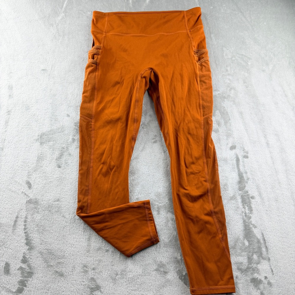Fabletics Women's Medium Orange Mesh Pocket High Waisted Leggings